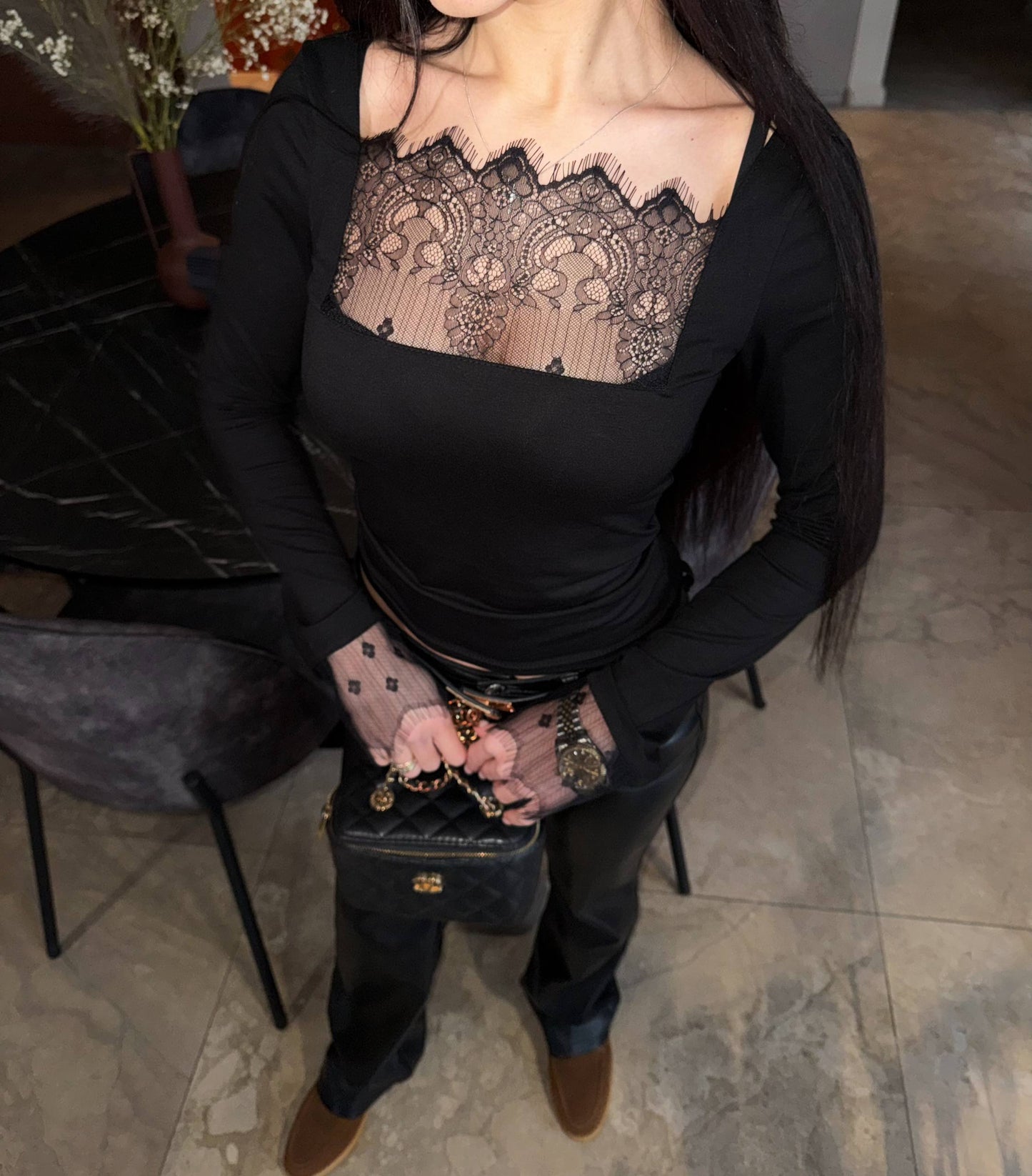 Blouse with lace and an open neckline