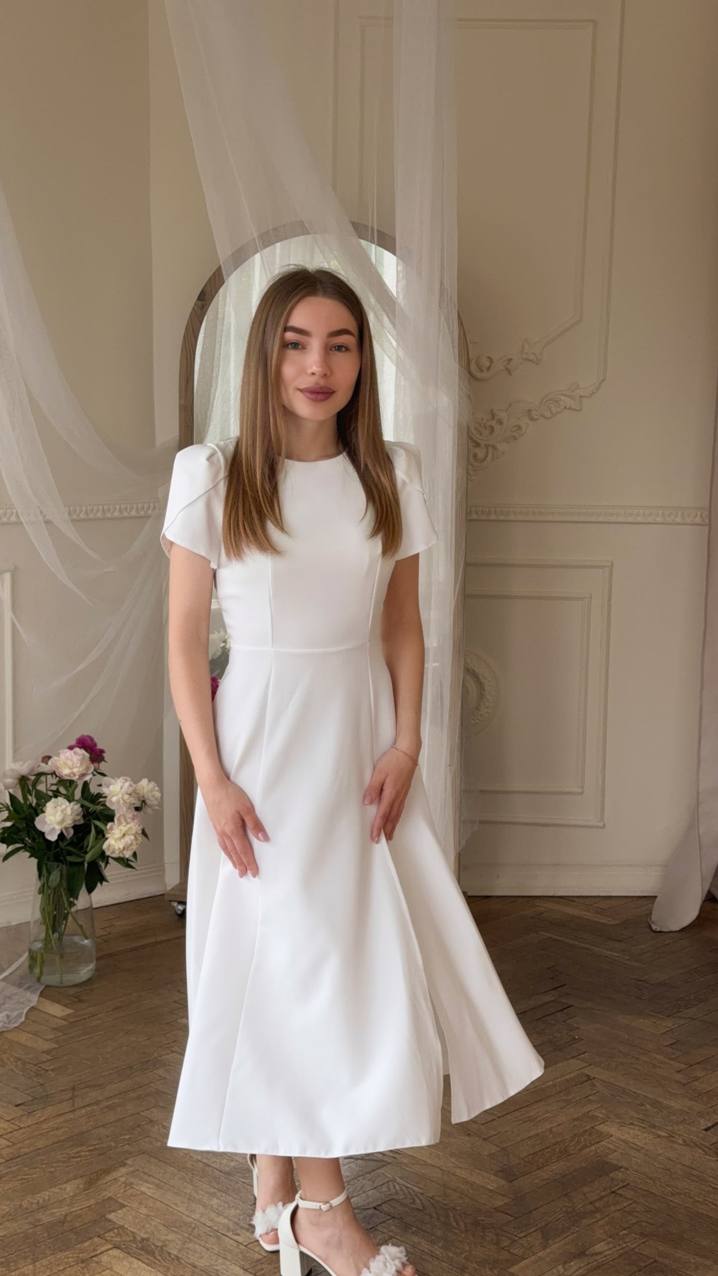 Dress with an open back and a leg slit
