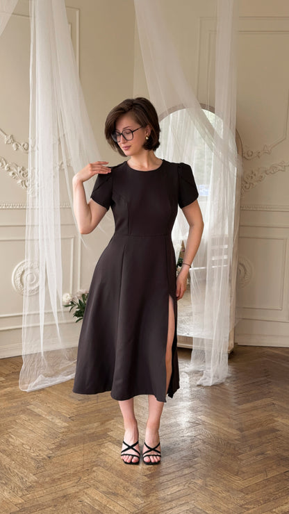 Dress with an open back and a leg slit