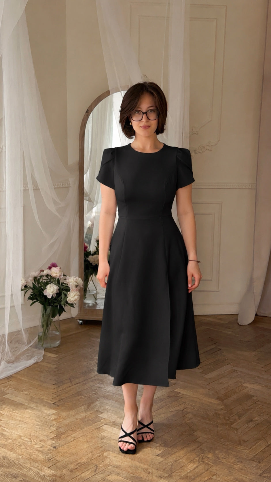 Dress with an open back and a leg slit