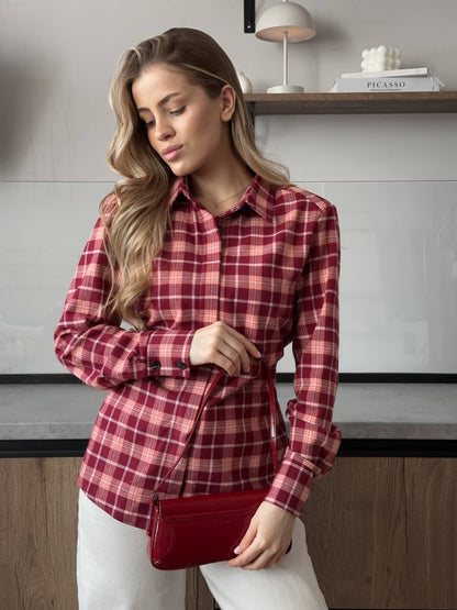 Shirt with shoulder pads