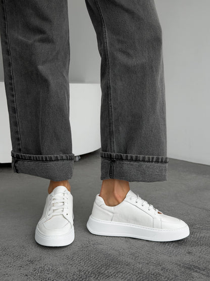 Stitched white sneakers