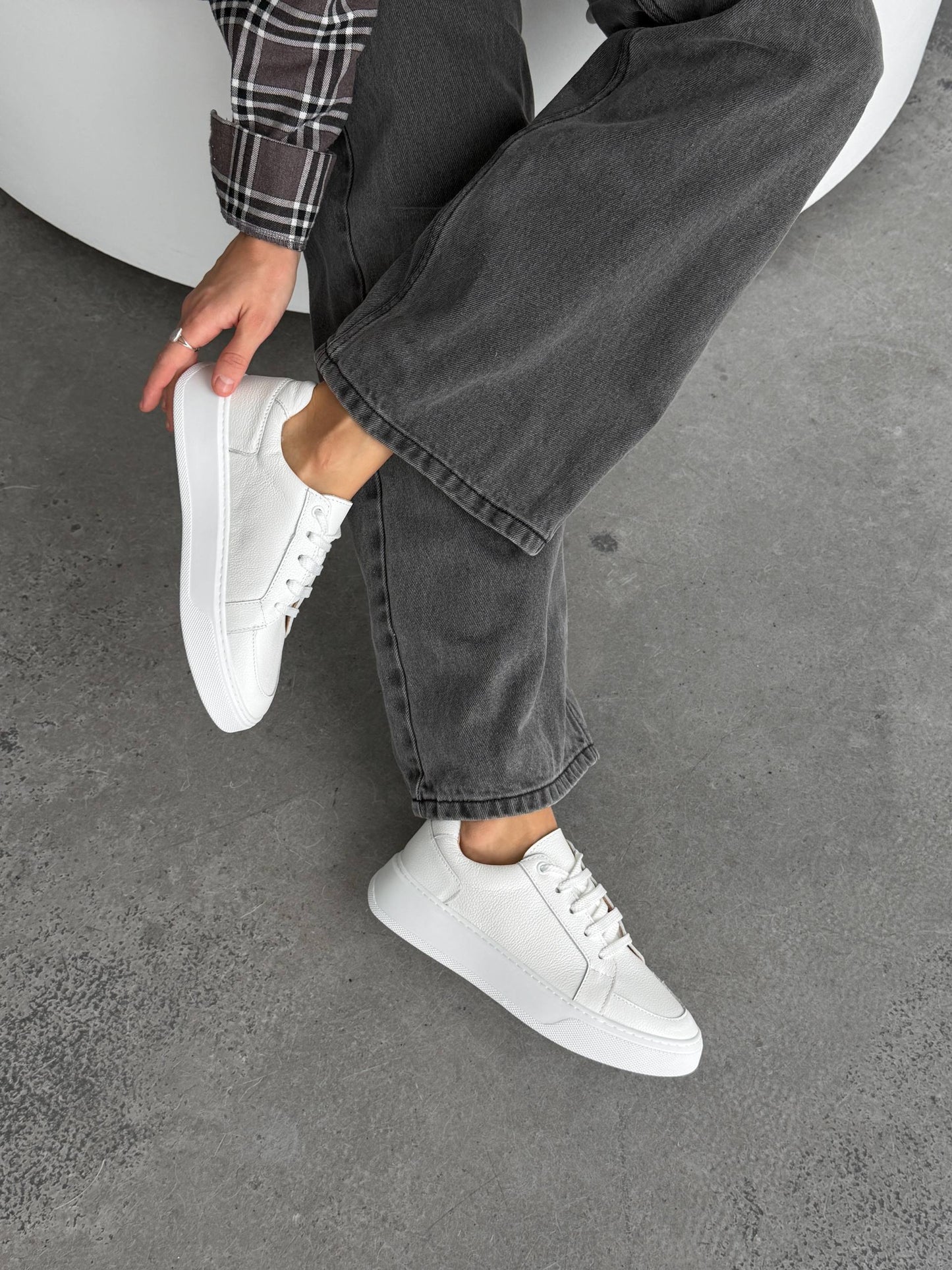 Stitched white sneakers