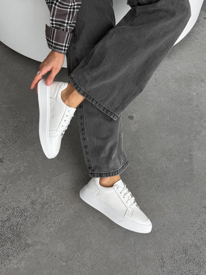 Stitched white sneakers