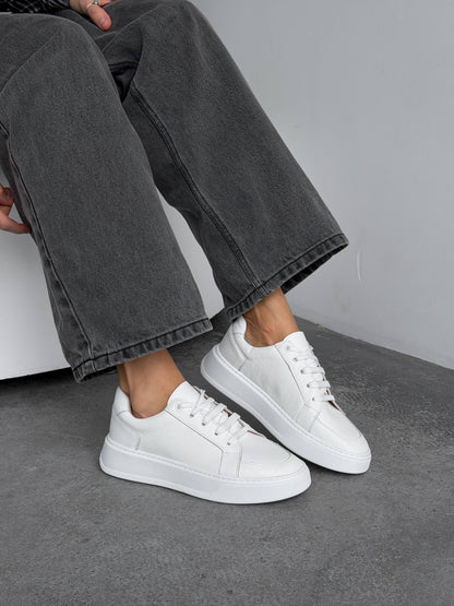 Stitched white sneakers