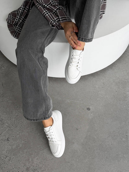 Stitched white sneakers