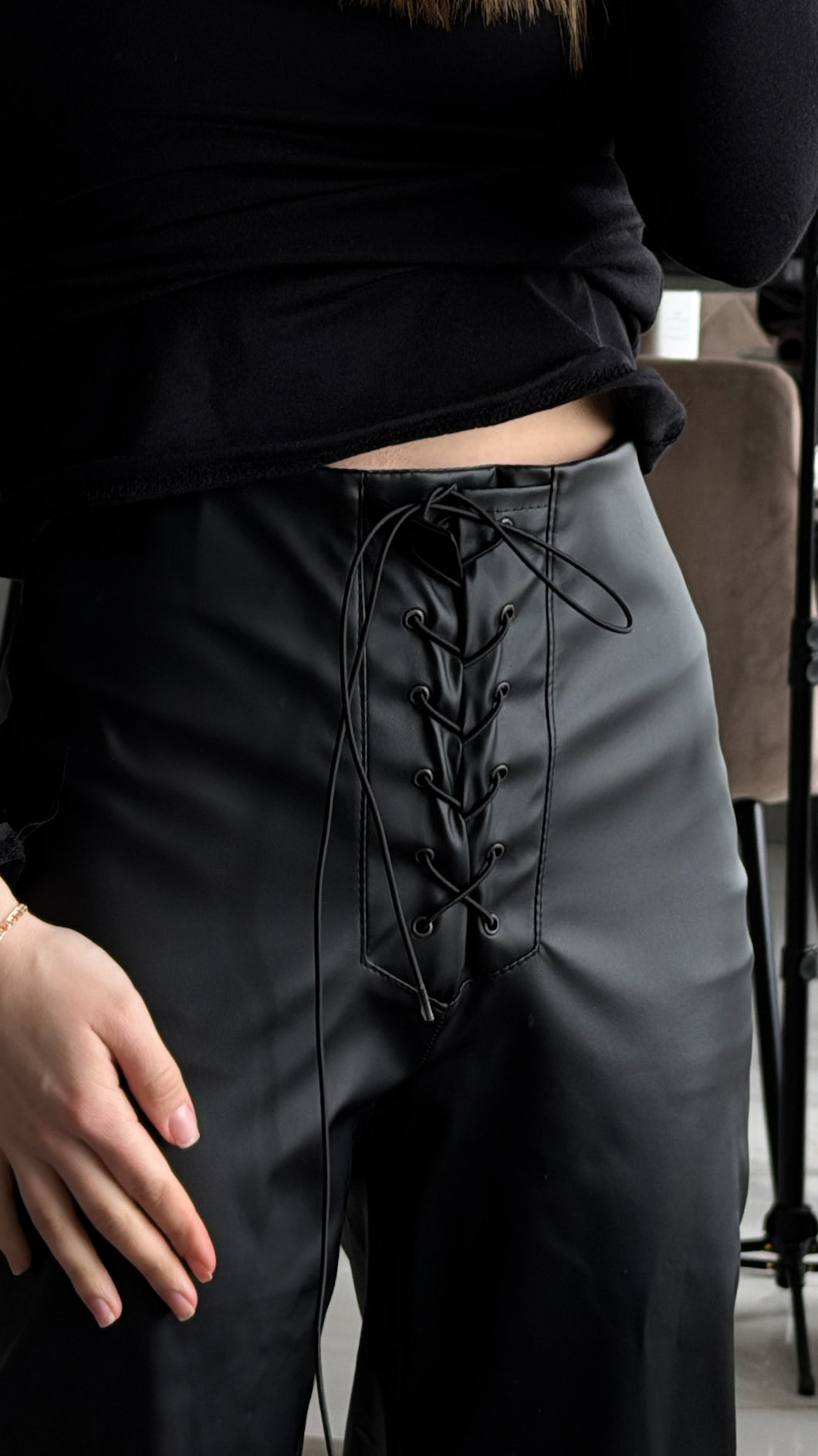 Lace-up faux leather trousers