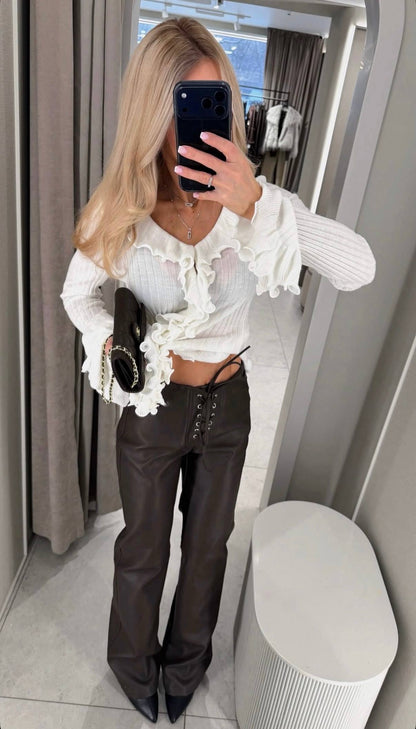 Lace-up faux leather trousers