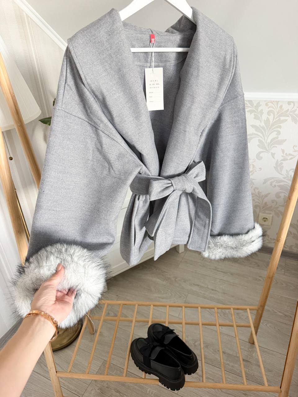 Coat with fur cuffs