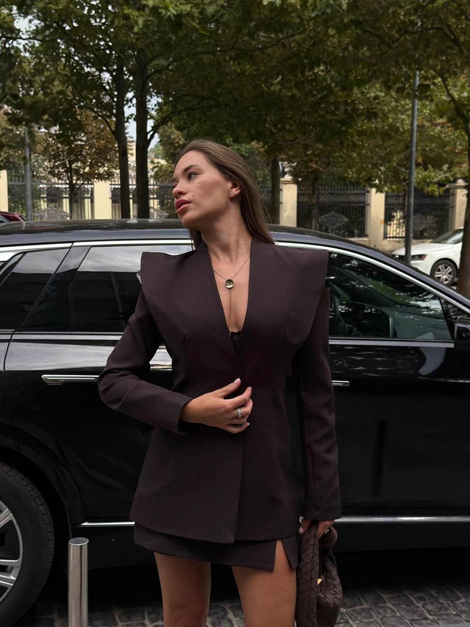 Suit: blazer with statement shoulders and skort