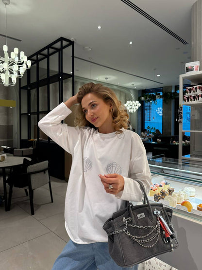 Luźny longsleeve z muszelkami