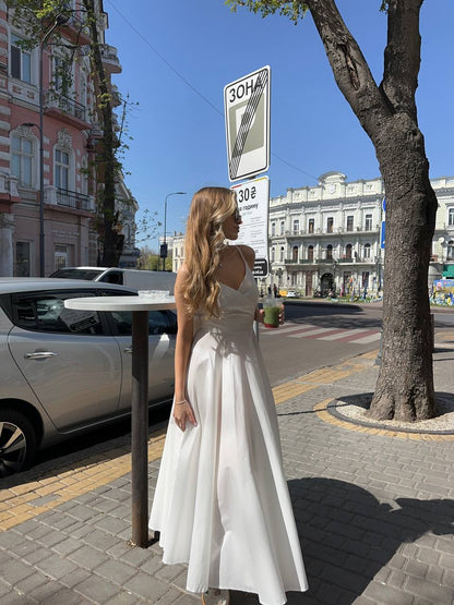 Сукня з відкритою спинкою та бантиком