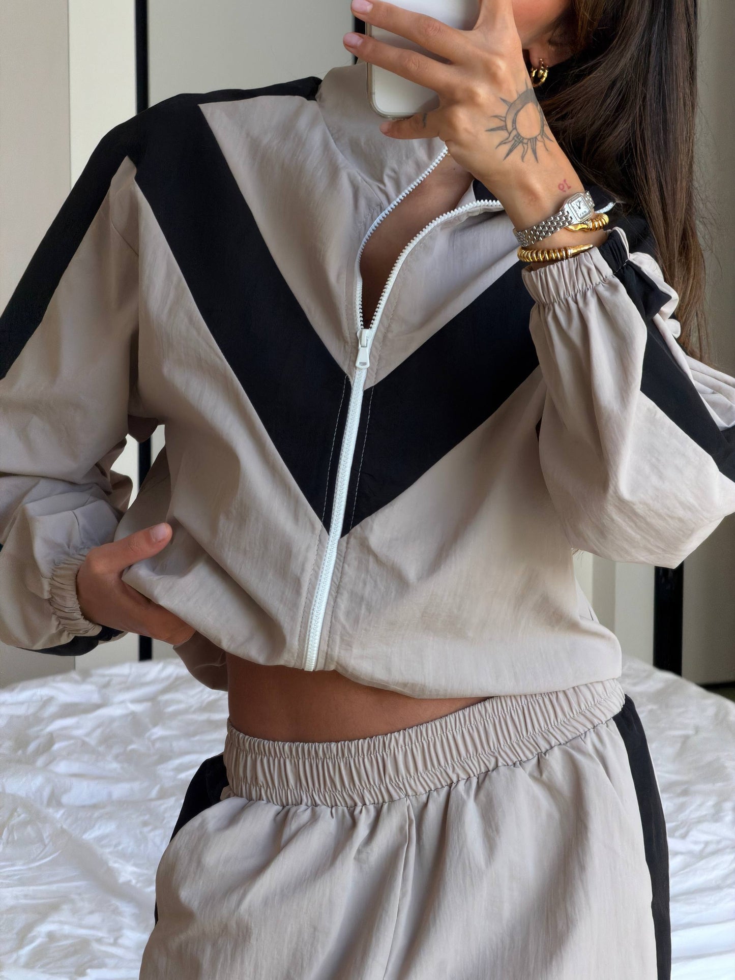 Tracksuit made of rain-resistant fabric