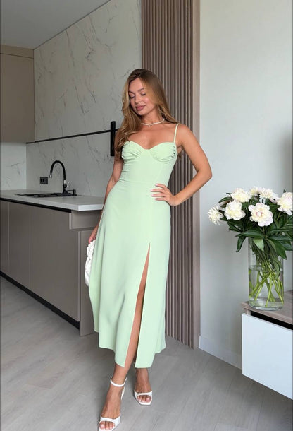A dress made of delicate double silk with an accentuated neckline