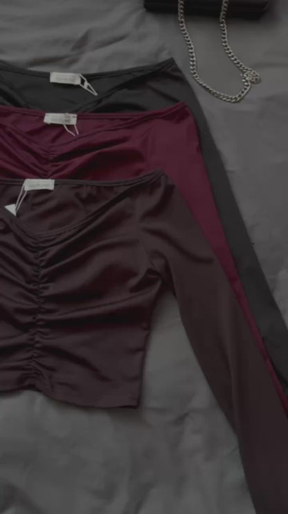 Лонгслів з драпіюванням посередині